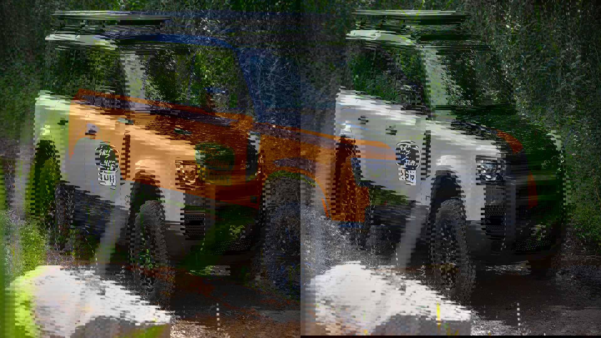 land-rover-defender-trophy-edition-side-on-trail.j